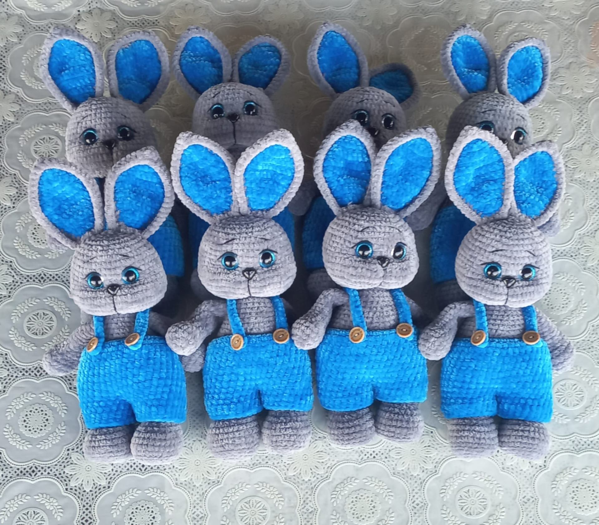A bunch of handmade blue bunnies